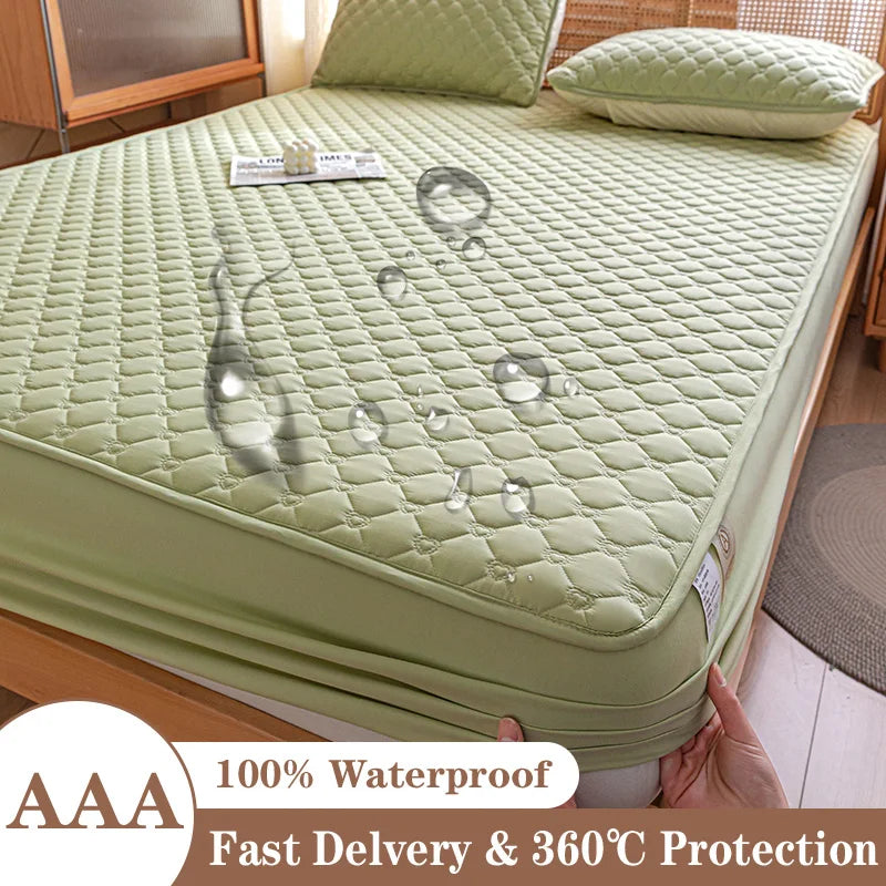 Green mattress protector on a bed with water droplets demonstrating its waterproof feature, labeled 'AAA 100% Waterproof'.