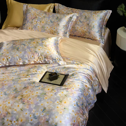 Floral bedding set on a bed with a nightstand in the background
