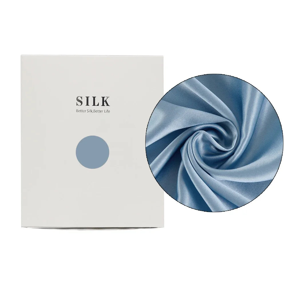 Silk product packaging with a close-up of blue silk fabric on a white background