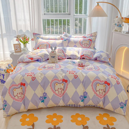 Children's bedroom with a bed featuring a colorful teddy bear pattern