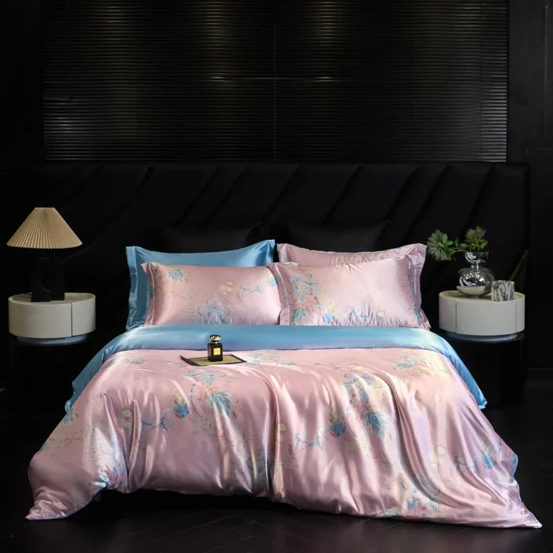 Pink and blue floral bedspread on a bed in a darkly decorated room.