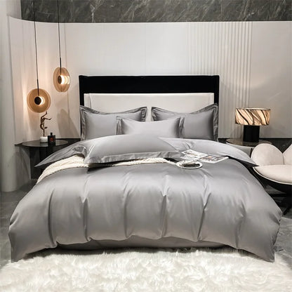 Modern bedroom with gray bedding and marble accents