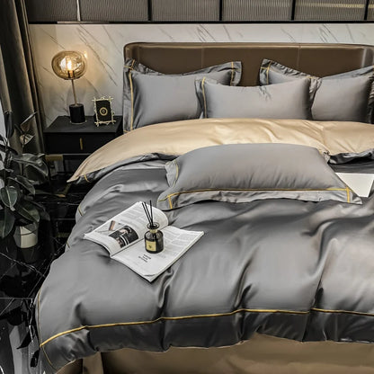 Gray and beige bedding set on a bed in a stylish bedroom.