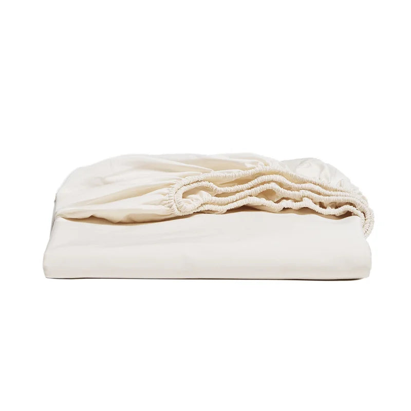 Folded beige blanket on a white background