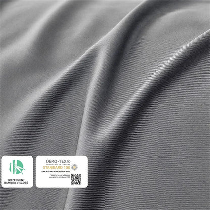 Gray fabric with OEKO-TEX and Standard 100 labels on a gray background