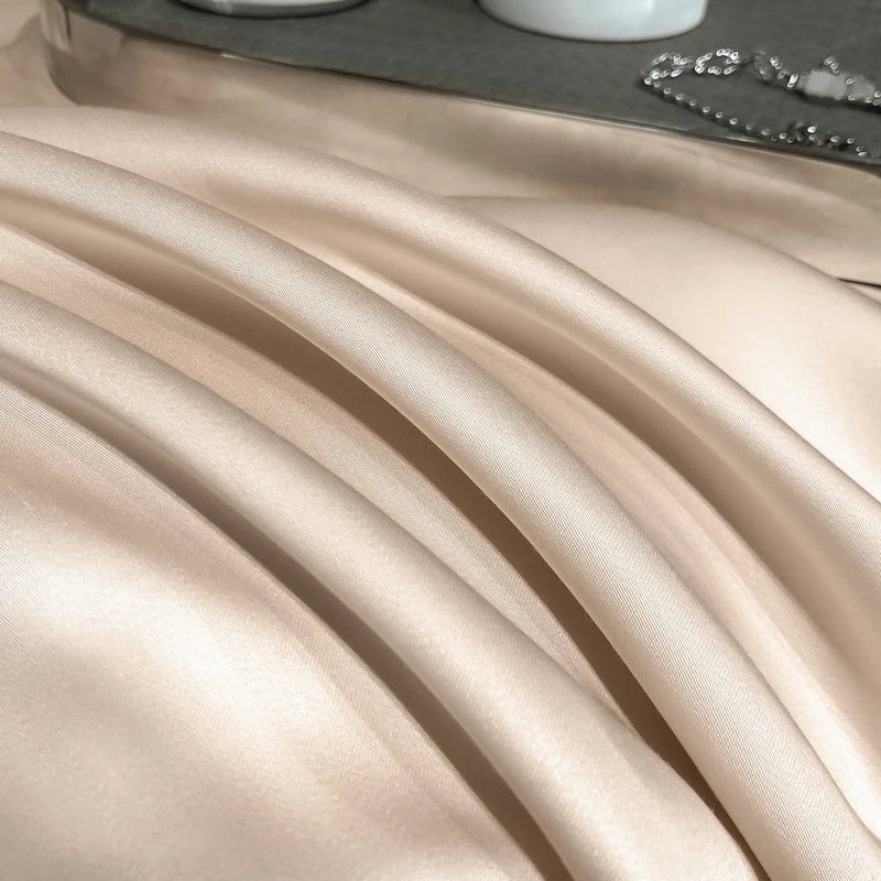 Close-up of beige satin fabric with a blurred background
