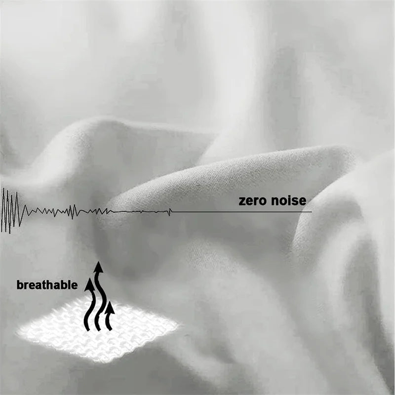 Textured fabric with 'zero noise' and 'breathable' text overlay on a light background