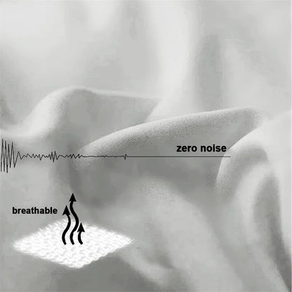 Textured fabric with 'zero noise' and 'breathable' text overlay on a light background