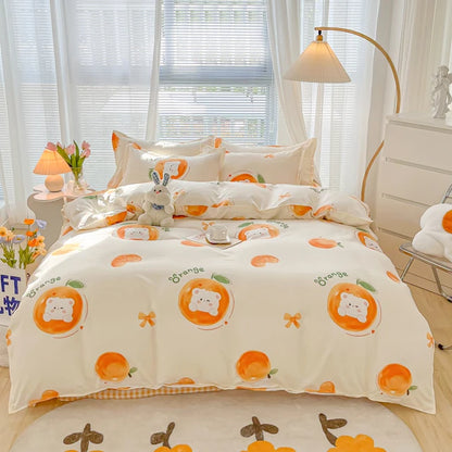 Bedding set with orange and bear pattern in a bedroom setting