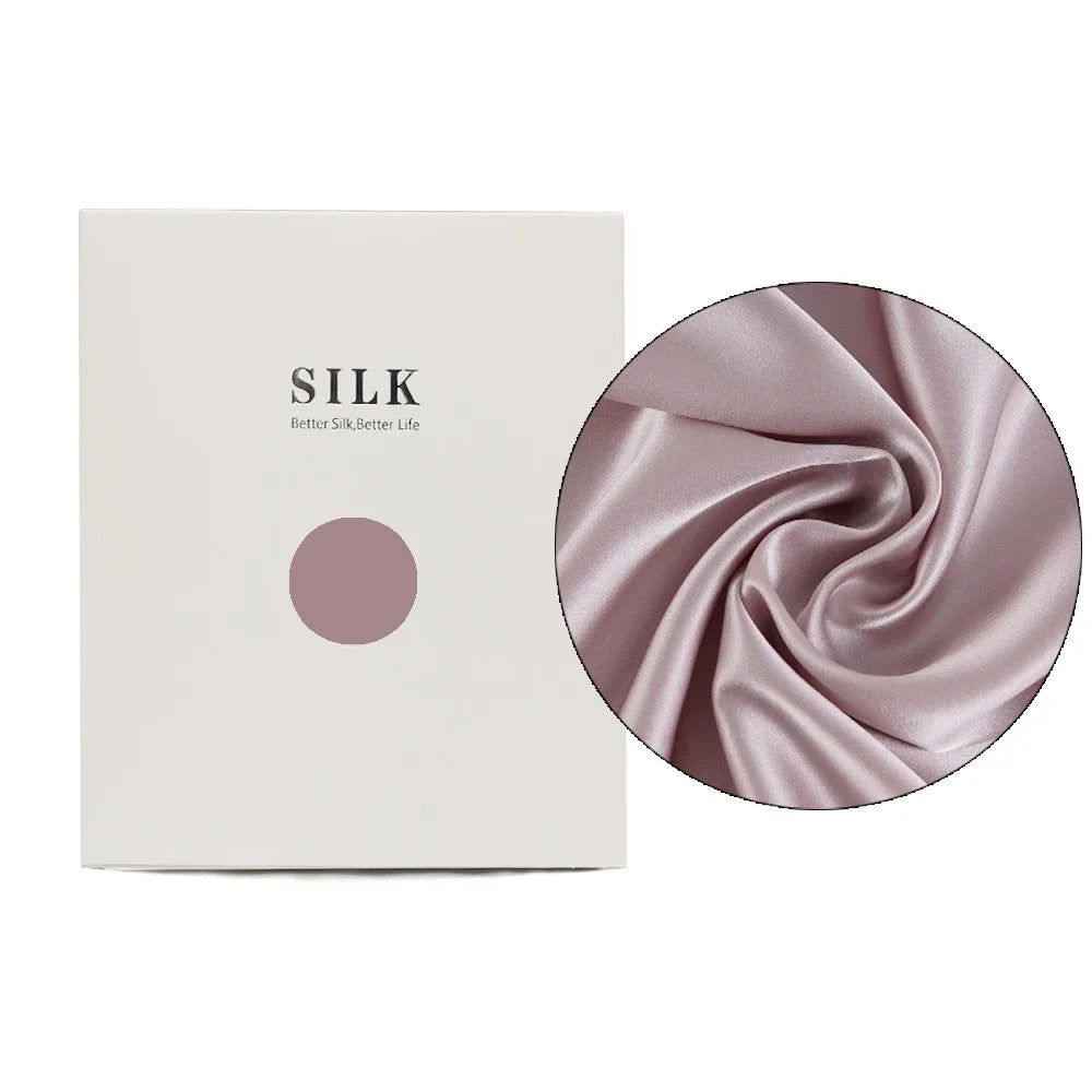Silk product packaging with a close-up of pink silk fabric on a white background