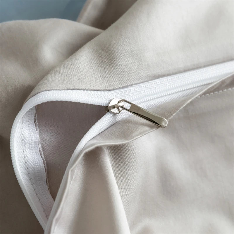 Close-up of a beige fabric with a zipper detail