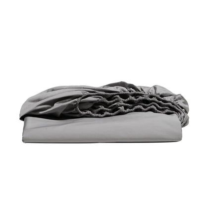 Gray fitted sheet on a white background