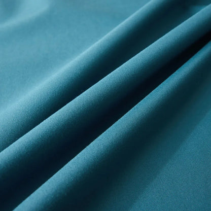Close-up of blue fabric with folds