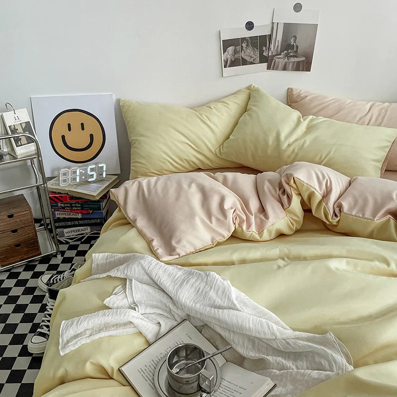 Neatly made bed with light-colored bedding in a room with a checkered floor.