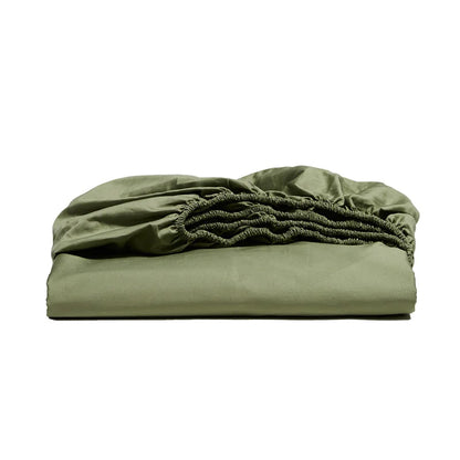 Folded green fitted sheet on a white background