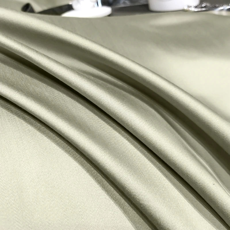 Close-up of light green fabric with folds