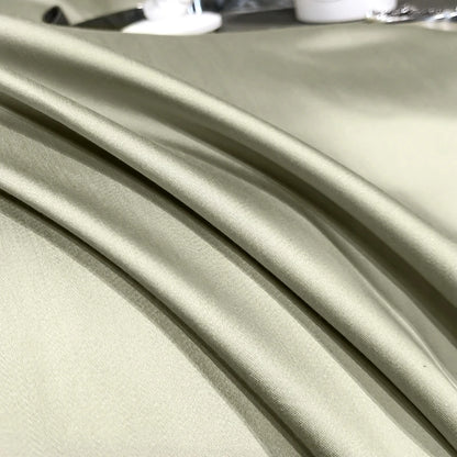 Close-up of light green fabric with folds