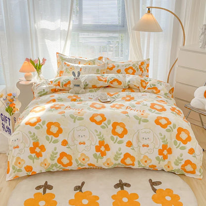 Floral bedding set with cartoon characters on a bed in a bright bedroom.