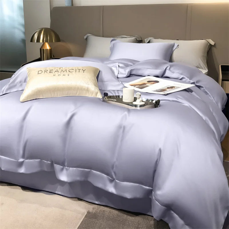 Purple bedding set on a bed with pillows and a tray in a bedroom setting.