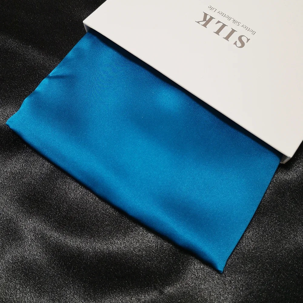 Blue silk fabric with a white box labeled 'Silk' on a black background