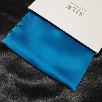 Blue silk fabric with a white box labeled 'Silk' on a black background