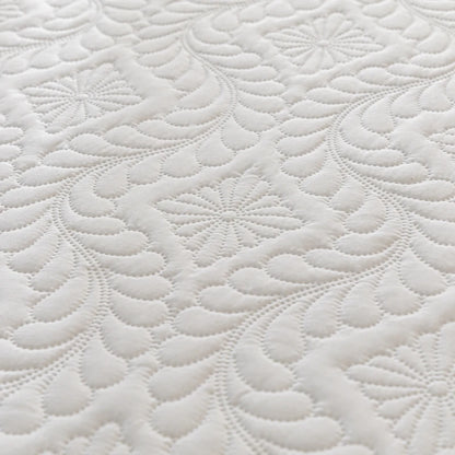 Close-up of a textured white fabric surface