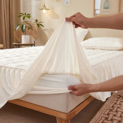 Person holding a white bed canopy over a bed in a bedroom setting.