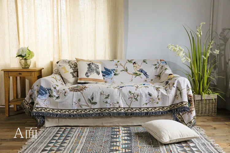 Sofa with a floral patterned cover in a living room setting