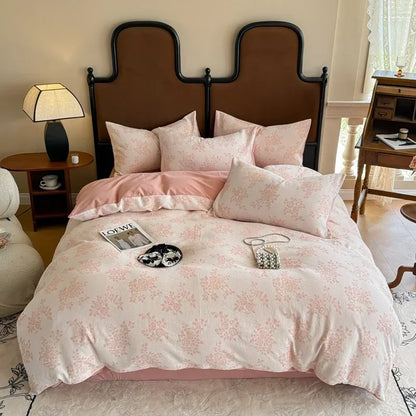 Bedroom with floral bedding and a wooden headboard
