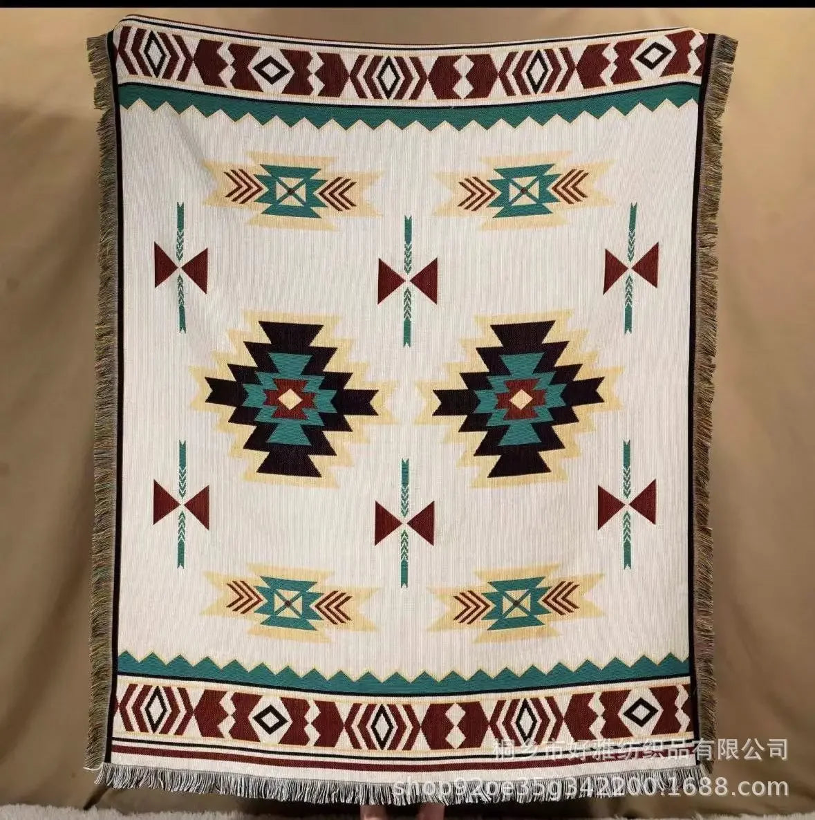 Decorative blanket with geometric pattern on a beige background