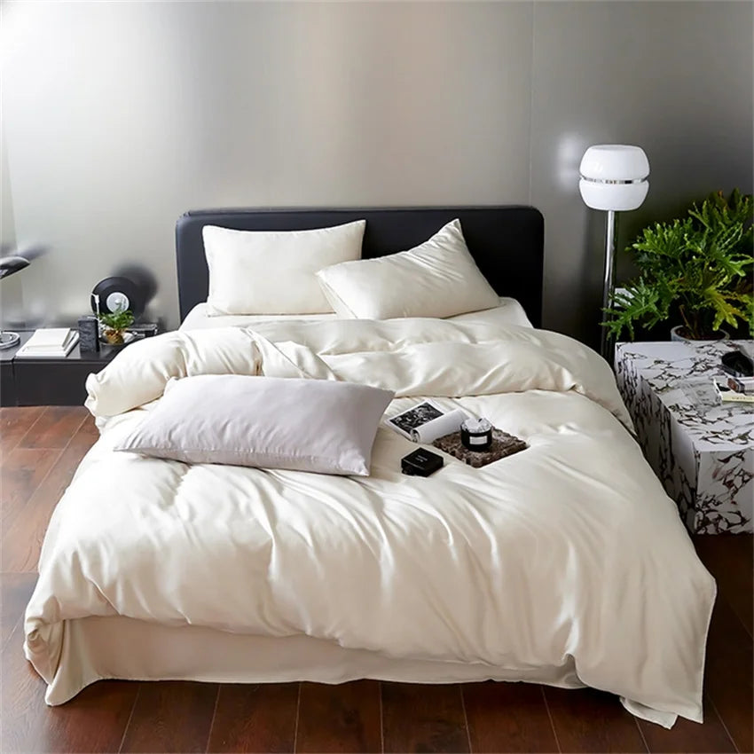 Neatly made bed with white bedding in a modern bedroom setting.