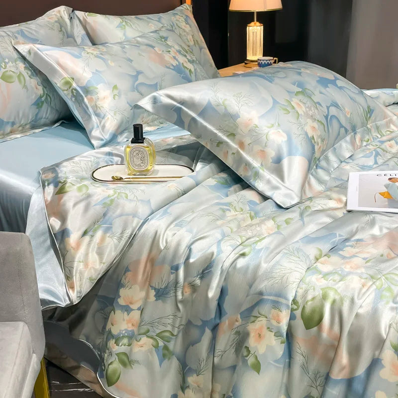 Floral bedding set on a bed with a nightstand and lamp in the background.