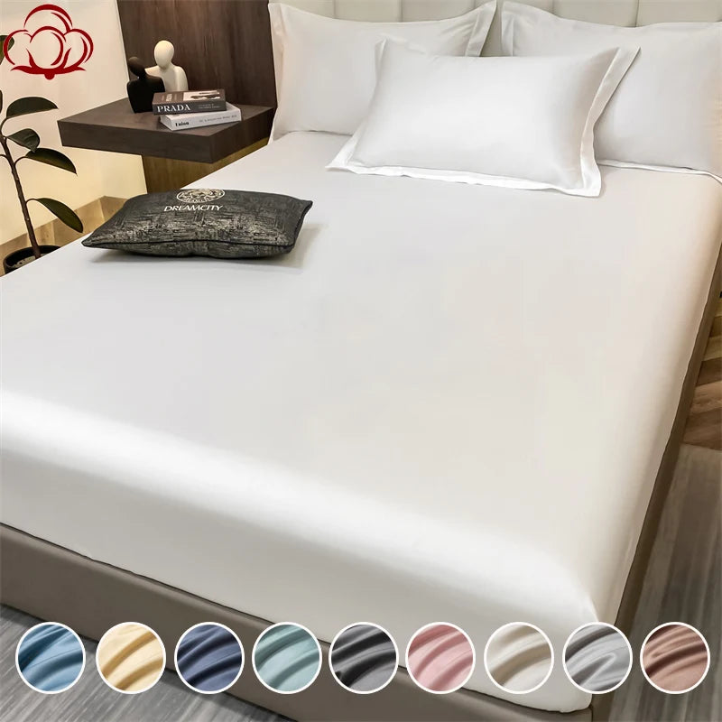 Bed with white bedding and color swatches at the bottom