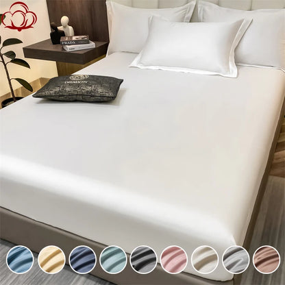 Bed with white bedding and color swatches at the bottom