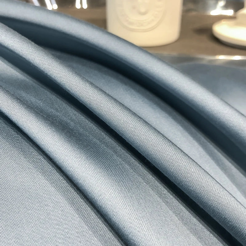 Close-up of light blue fabric with a blurred background