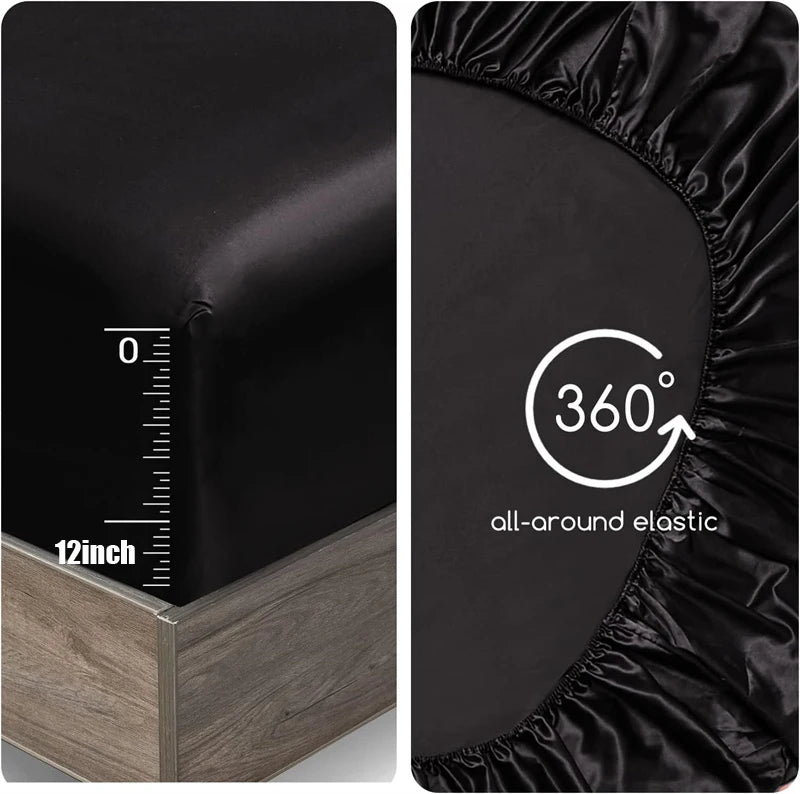 Black fitted sheet with 360-degree all-around elastic feature on a bed.