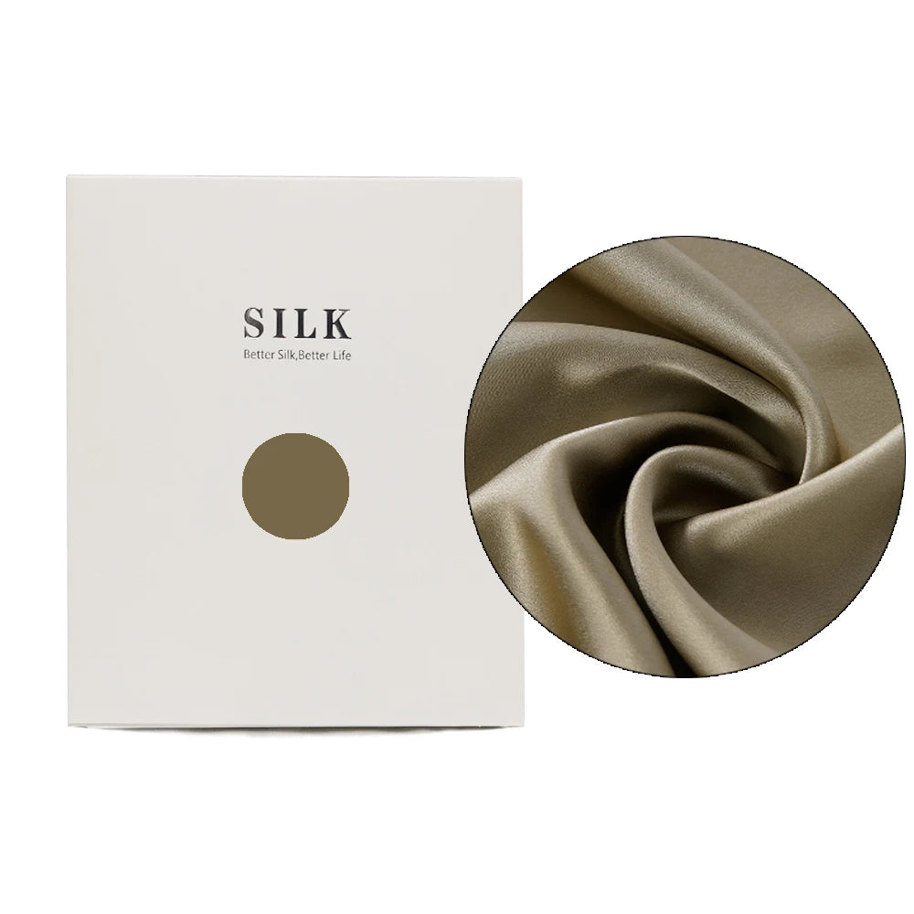 Silk fabric with a close-up detail and a branded box on a white background