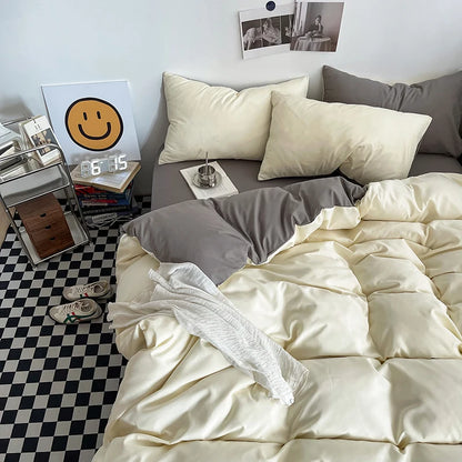 Neatly made bed with beige bedding in a room with a checkered floor.