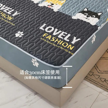 Bedding set with cartoon cat design and 'LOVELY FASHION' text on a mattress.