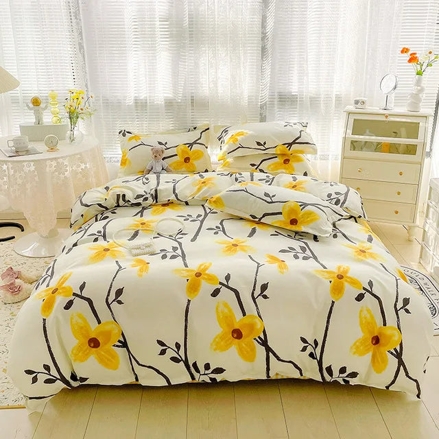 Floral patterned bedding set on a bed in a bright bedroom.