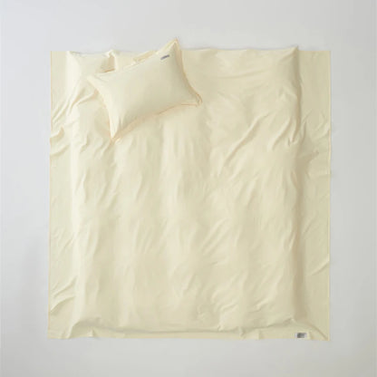 Beige pillowcase on a light gray background
