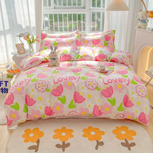 Floral patterned bedding set on a bed in a bright room with toys and decor.