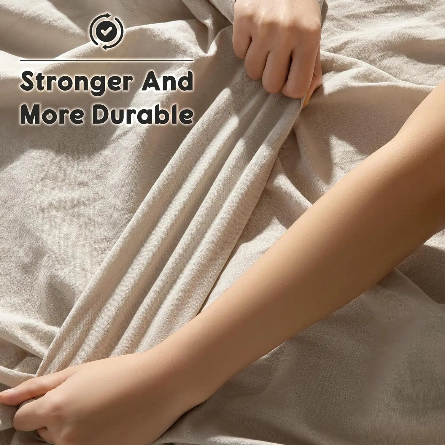 Person holding beige fabric with text 'Stronger And More Durable' on a light background