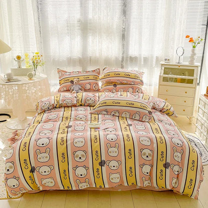 Cute cartoon-themed bedding set with 'Cute' text in a bedroom setting.