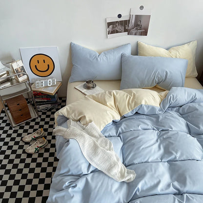 Bed with light blue bedding and pillows in a room with a checkered floor.