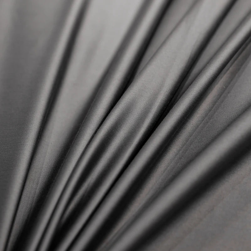 Close-up of dark gray fabric with folds