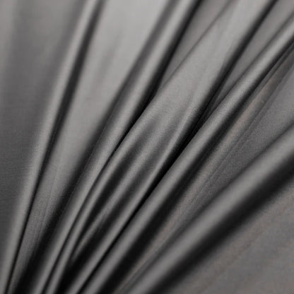 Close-up of dark gray fabric with folds